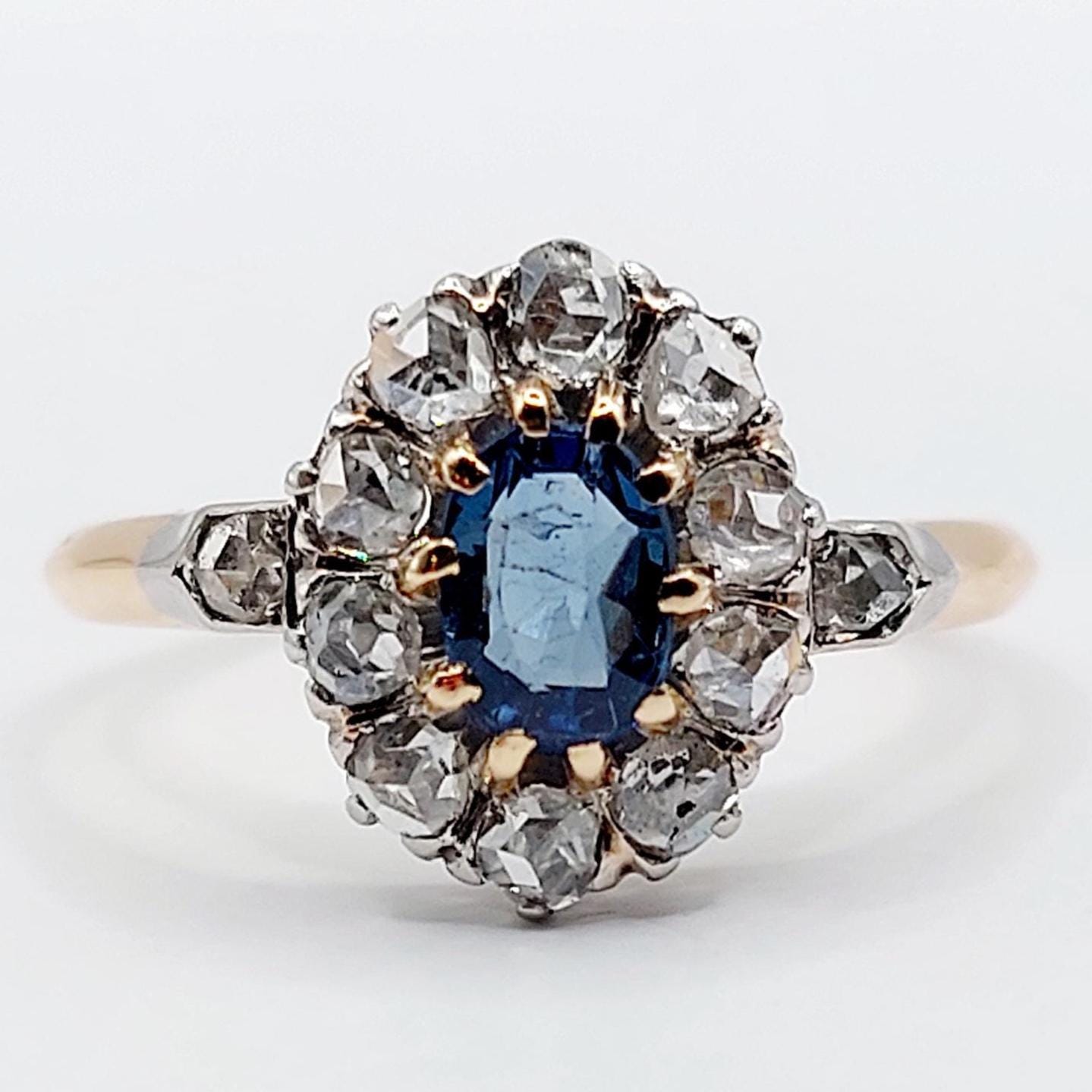 Bague marguerite antique or 18k et platine ornée d'un saphir