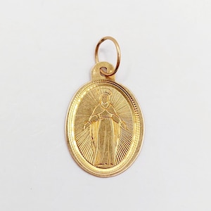 Tiny French victorian religious medal 18k rose gold representing a virgin surrounded by finely chiseled decorations (circa 1881)