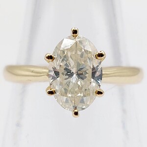 Vintage solitaire ring 14k gold set with a 1.51 carat oval cut diamond Color J-K purity SI2 with GWLAB certificate