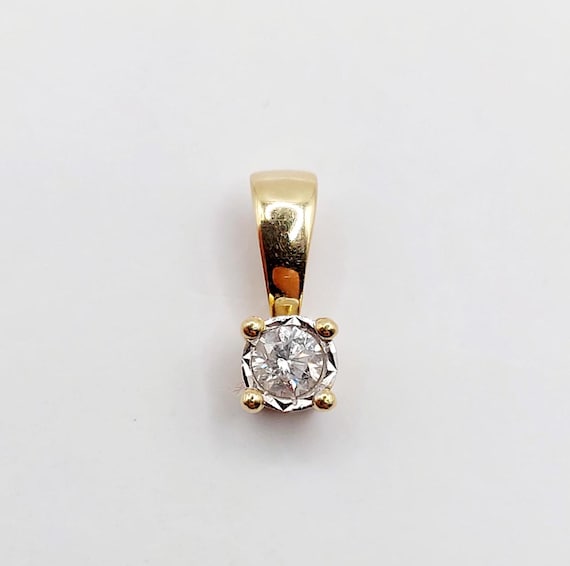 Pendentif art deco or 18k ornée d'un diamant de 0,10 carats en serti étoilé (circa 1960)
