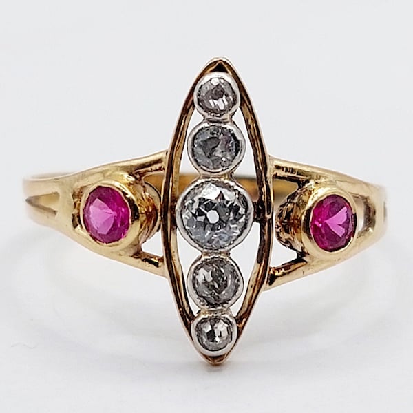 French antique marquise ring 18k gold and platinum set with a line of old mine cut diamonds shouldered with rubies (circa 1920)