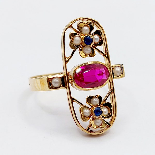 French marquise ring 18k gold set with a synthetic ruby, flowers, pearls and sapphires in a finely openwork setting (circa 1920)