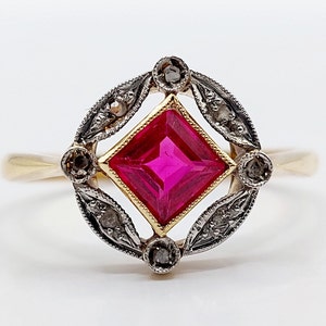 French art deco ring 18k gold set with a synthetic ruby and rose cut diamonds in a finely decorated setting (circa 1930)