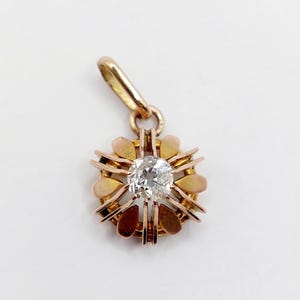 French Victorian pendant 18k rose gold set with a 0.20 carats old mine cut diamond in prong setting (circa 1880) charm