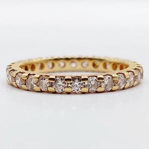 French vintage eternity band 18k gold set with 0.84 carats of brillant cut diamonds (circa 1970) ring art deco