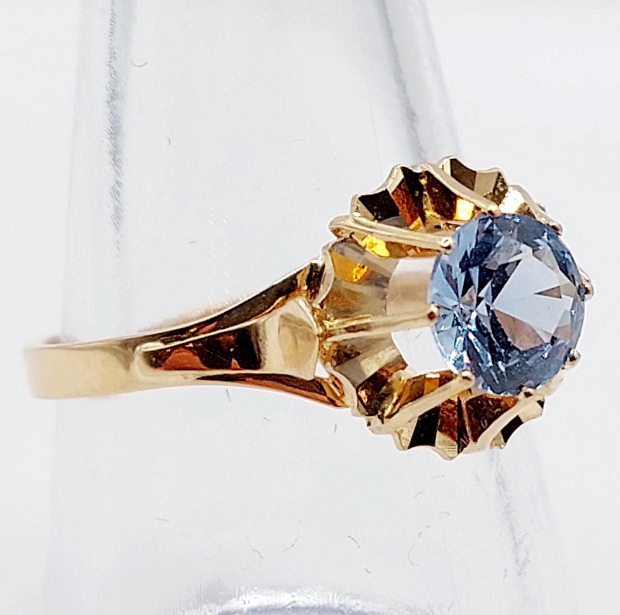 French vintage solitaire ring 18k rose gold set with a 1.20 carat synthetic blue spinel in a prong setting (circa 1970) art deco