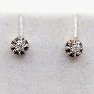 French Art Deco stud earrings 18k rose gold and platinum set with old mine cut diamonds in a star setting (circa 1920)