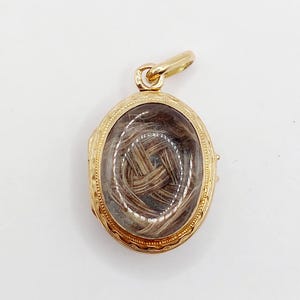French antique secret locket reliquary pendant 18k gold photo holder finely crafted and a lock of hair (circa 1900) charm