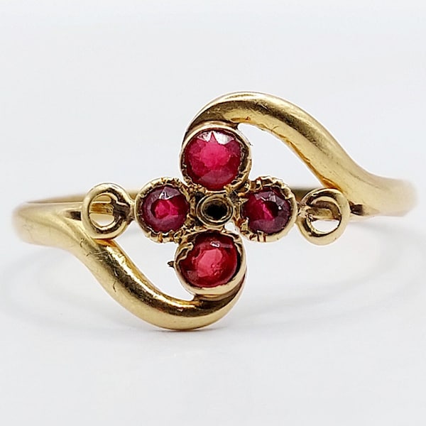 French antique flower ring 18k gold set with garnets in a finely crafted swirl setting (circa 1900) victorian