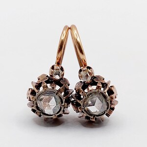 French Victorian sleepers earrings 18k rose gold set with a rose cut diamond in a finely crafted setting (circa 1880) lever back dormeuse