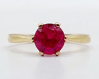 Bague solitaire art deco or 18k ornée d'un rubis synthétique de 0,50 carats (circa 1970)