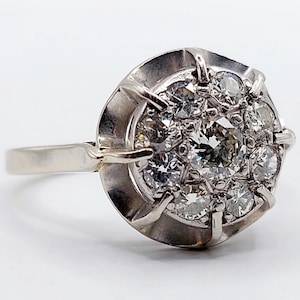 French art deco flower ring 18k white gold set with 0.65 carats of brilliant cut diamonds in a finely crafted setting (circa 1950)