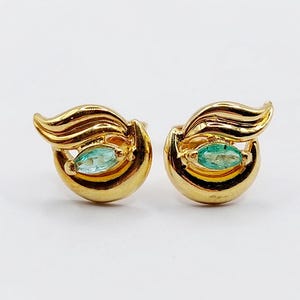 French Vintage stud earrings 18k gold set with shuttle cut emeralds in a finely crafted scroll setting