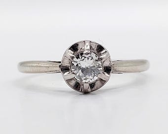 French art deco solitaire ring 18k white gold set with a 0.15 carat brilliant cut diamond (circa 1930)