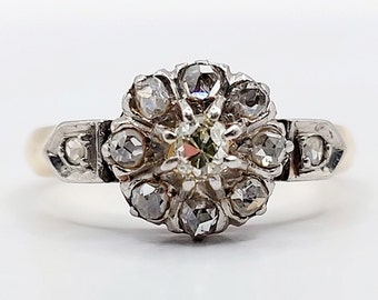 French Victorian daisy ring 18k gold set a 0.10 carats old mine cut diamond surrounded by rose cut diamonds (circa 1900)
