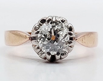 French antique solitaire ring 18k rose gold set with a a 0.70  carat old mine cut diamond in prong setting (circa 1900)