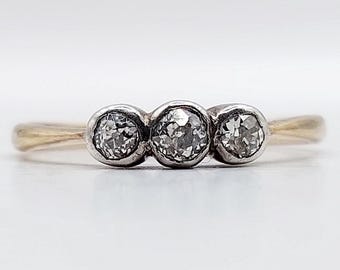 French Antique ring 18k gold and platinum set with old mine cut diamonds in a bezel setting (circa 1920)