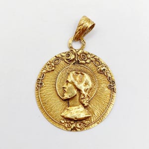 French antique religious medal 18k gold representing the Christ and finely chiseled decorations (circa 1930)