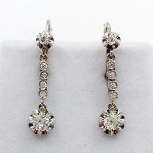French antique sleepers earrings 18k white gold set with 0.58 carats of old cut diamonds (circa 1930) dormeuses lever back