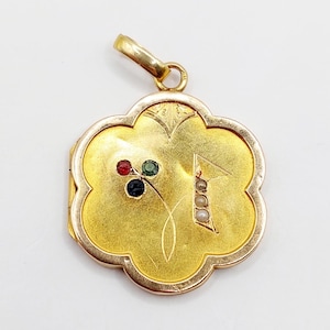 French antique secret locket, photo holder pendant 18k gold set with a red paste, an emerald, a sapphire and pearls (circa 1910)