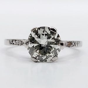 French art deco solitaire Platinum ring set with a 1.25 carat old european cut diamond and rose cut diamonds (circa 1920) Engagement