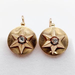 French antique sleeper earrings 18k rose gold forming a star set with a rose cut diamond (circa 1900) lever back