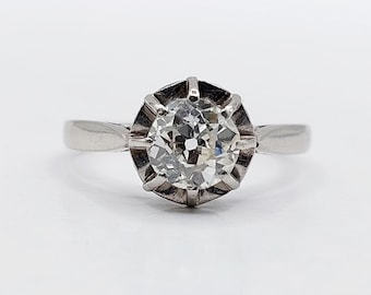 French art deco solitaire Platinum ring set with a 0.70 carat old european cut diamond (circa 1920)