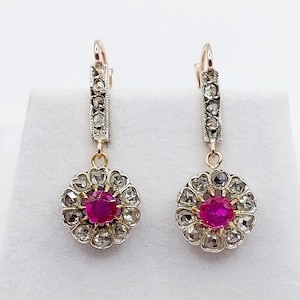 French antique sleepers 18k rose gold set with rubies and rose cut diamonds in a daisy shaped setting (circa 1920) lever back earrings