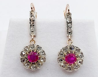 French antique sleepers 18k rose gold set with rubies and rose cut diamonds in a daisy shaped setting (circa 1920) lever back earrings