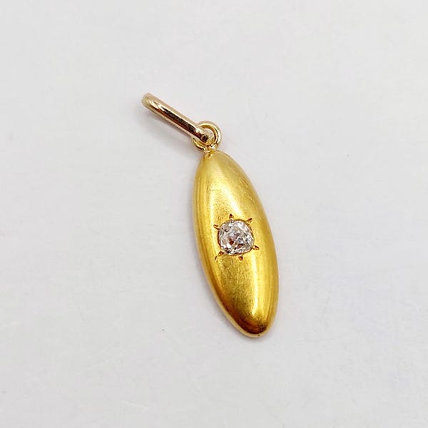 French Art Deco marquise pendant 18k gold and 0.10 carat old mine cut diamond in star setting (circa 1930)