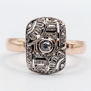 French art deco ring 18k white and rose gold set with an old mine cut diamond in a finely crafted setting (circa 1920)