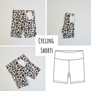 May include: Cycling shorts with a leopard print pattern in black, white, orange, and yellow. The shorts are shown in three different views, including a flat lay and a close-up of the fabric. The text "CYCLING SHORTS" is displayed in the centre of the image.