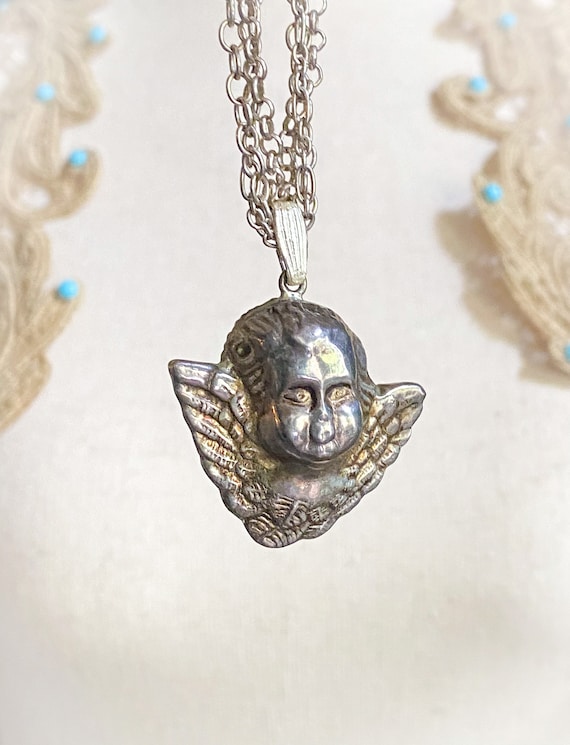 Antique angel pendant, puffy silver angel necklace
