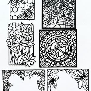 May include: Black laser-cut decorative panels featuring various designs. The panels include bees in a honeycomb, a dragonfly, flowers, and floral and butterfly frames. The intricate cut-out details create a delicate and artistic aesthetic.