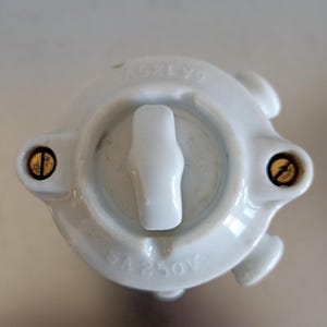 Vintage roterande ljusströmbrytare i porslin – 250V 110 V