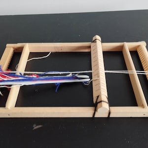 Vintage Wooden German Tabletop Weaving Loom in working condition.