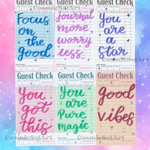 May include: Set of six guest check-style art prints with inspirational quotes in colorful cursive lettering. Phrases include "Focus on the good," "Journal more, worry less," and "You are a star." Each print has a unique pastel background.
