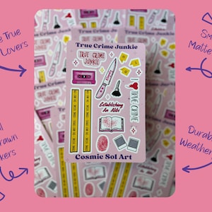 May include: A sheet of pink stickers with a "True Crime Junkie" theme. The stickers feature illustrations of a cassette tape, a knife, a fingerprint, and the text "Establishing An Alibi". The stickers are durable and weatherproof.