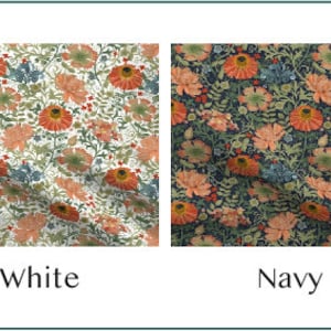 May include: Two fabric swatches with floral patterns. One is white with orange, red, and blue flowers and green leaves. The other is navy blue with the same floral design. The word "White" and "Navy" are below each swatch.