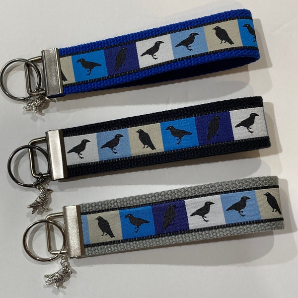 Crow Raven on tones of blue Jacquard Ribbon Key Fob Wristlet Keychain Keyring