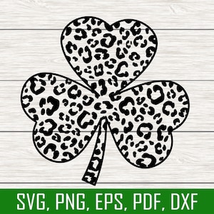 May include: Black and white shamrock with a leopard print pattern.
