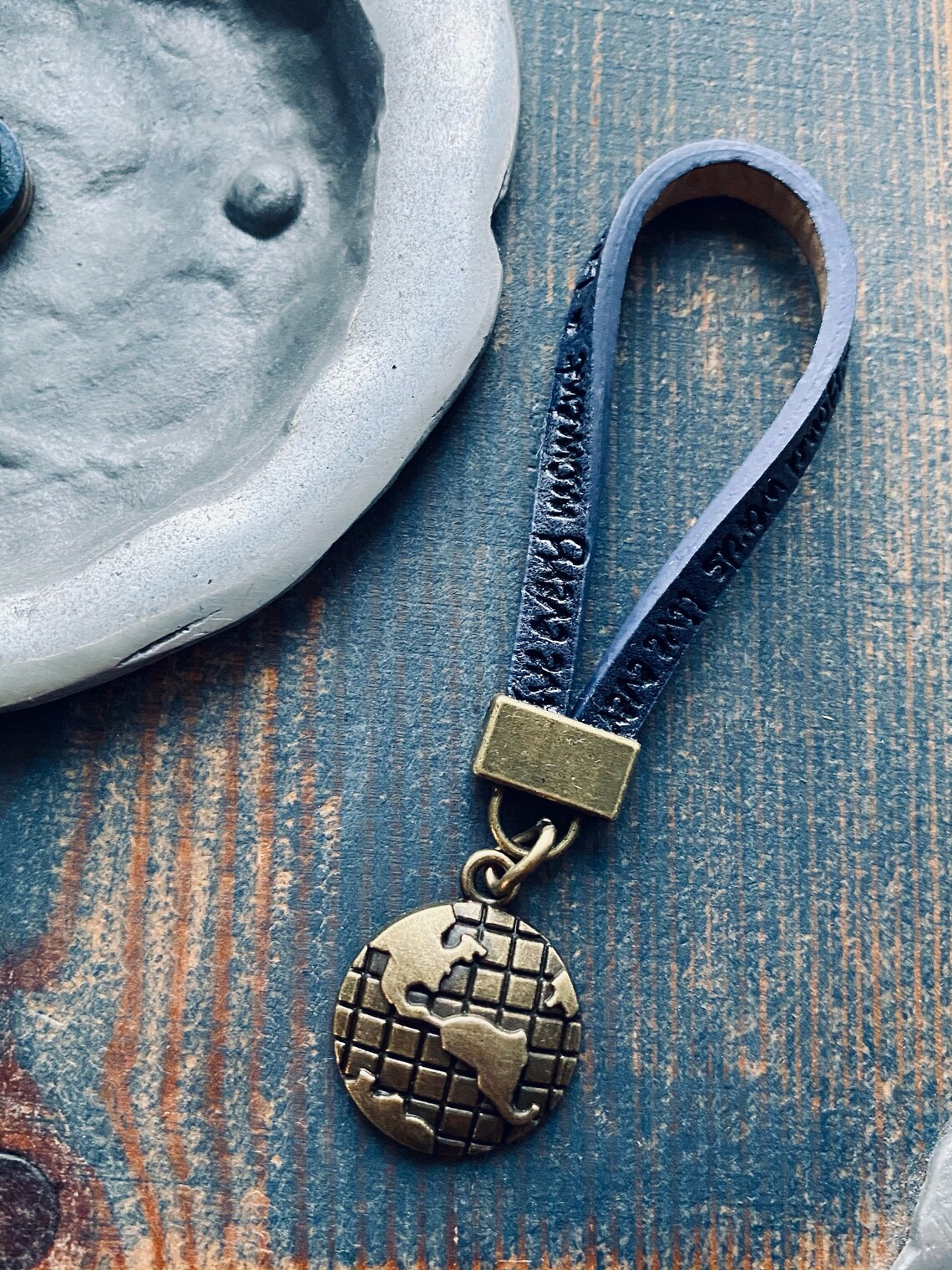World globe keychain in three colours. Etsy