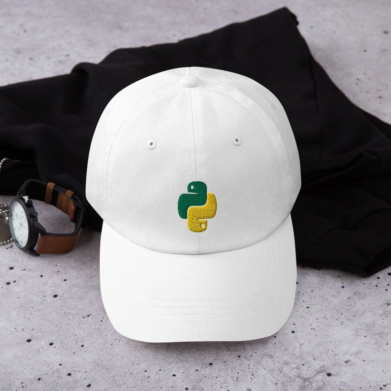 May include: White baseball cap with a green and yellow embroidered Python logo.