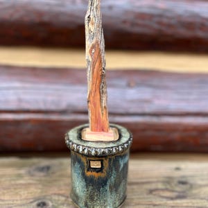 Handmade Ceramic Stoneware Lidded Jar, Wood Handle with Iron and Gold Colored Glazes on Brown Clay, 4” diameter x 13” height. Artist Stamped