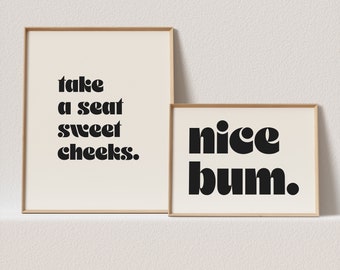 May include: Two framed prints with black text on a white background. The first print says "take a seat sweet cheeks." The second print says "nice bum."