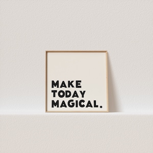 Könnte beinhalten: Ein gerahmter Druck mit dem Text "MAKE TODAY MAGICAL." in schwarzer Schrift auf weißem Hintergrund.