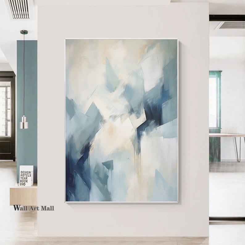 May include: Abstract painting with blue and white hues. The painting features a variety of shapes and lines, creating a sense of movement and depth. The colors are soft and muted, giving the painting a calming and serene feel.