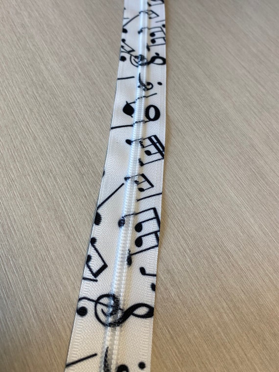 white zipper tape with black music notes Size 5 custom zipper tape by