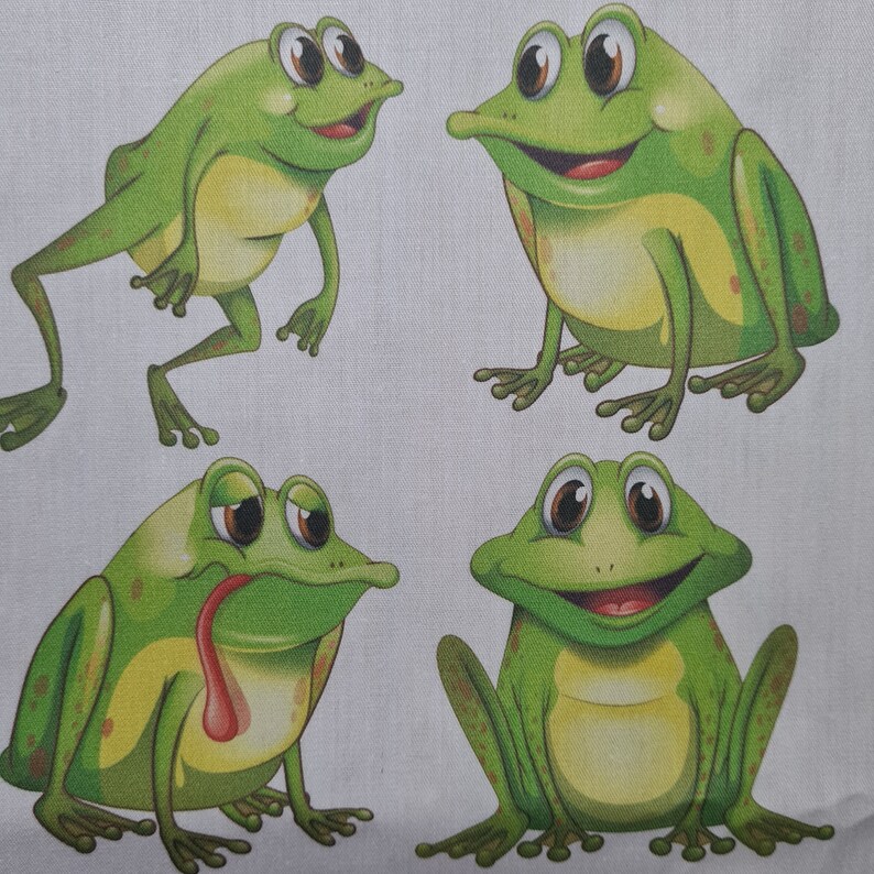 May include: Four cartoon frogs in various poses. The frogs are primarily green with yellow bellies and brown eyes. One frog has its tongue extended. The frogs are on a light gray background.