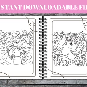 Peut inclure: Un livre de coloriage avec deux pages pr&eacute;sentant des illustrations en noir et blanc d'une licorne. Une page montre une licorne portant une couronne de fleurs et entour&eacute;e de fleurs. L'autre page montre une licorne flottant sur une bou&eacute;e dans l'eau.